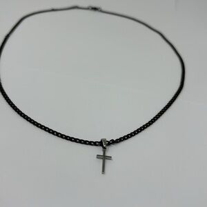 Men's necklace with a black metal chain and a silver cross.